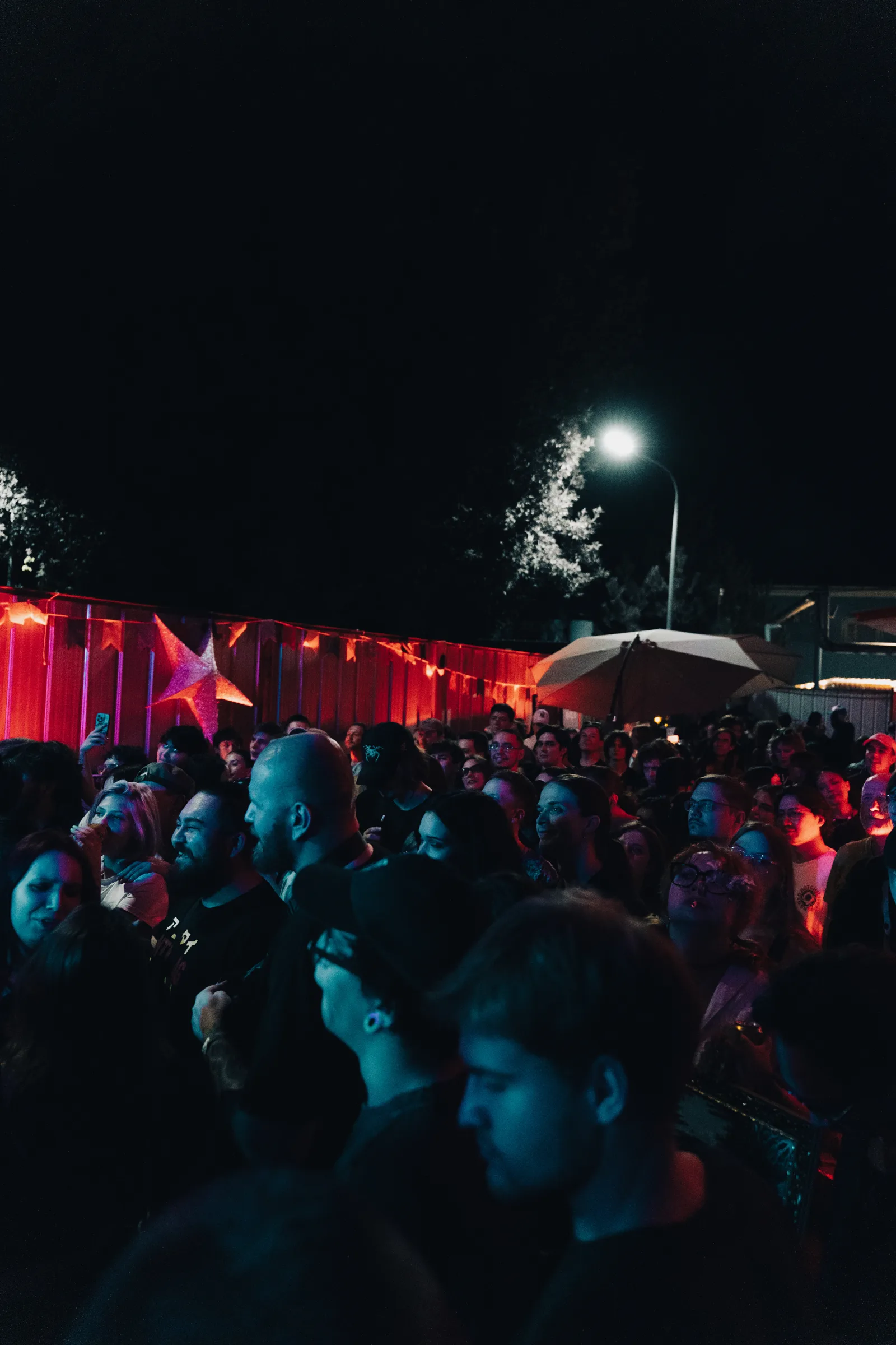 The crowd in blue light
