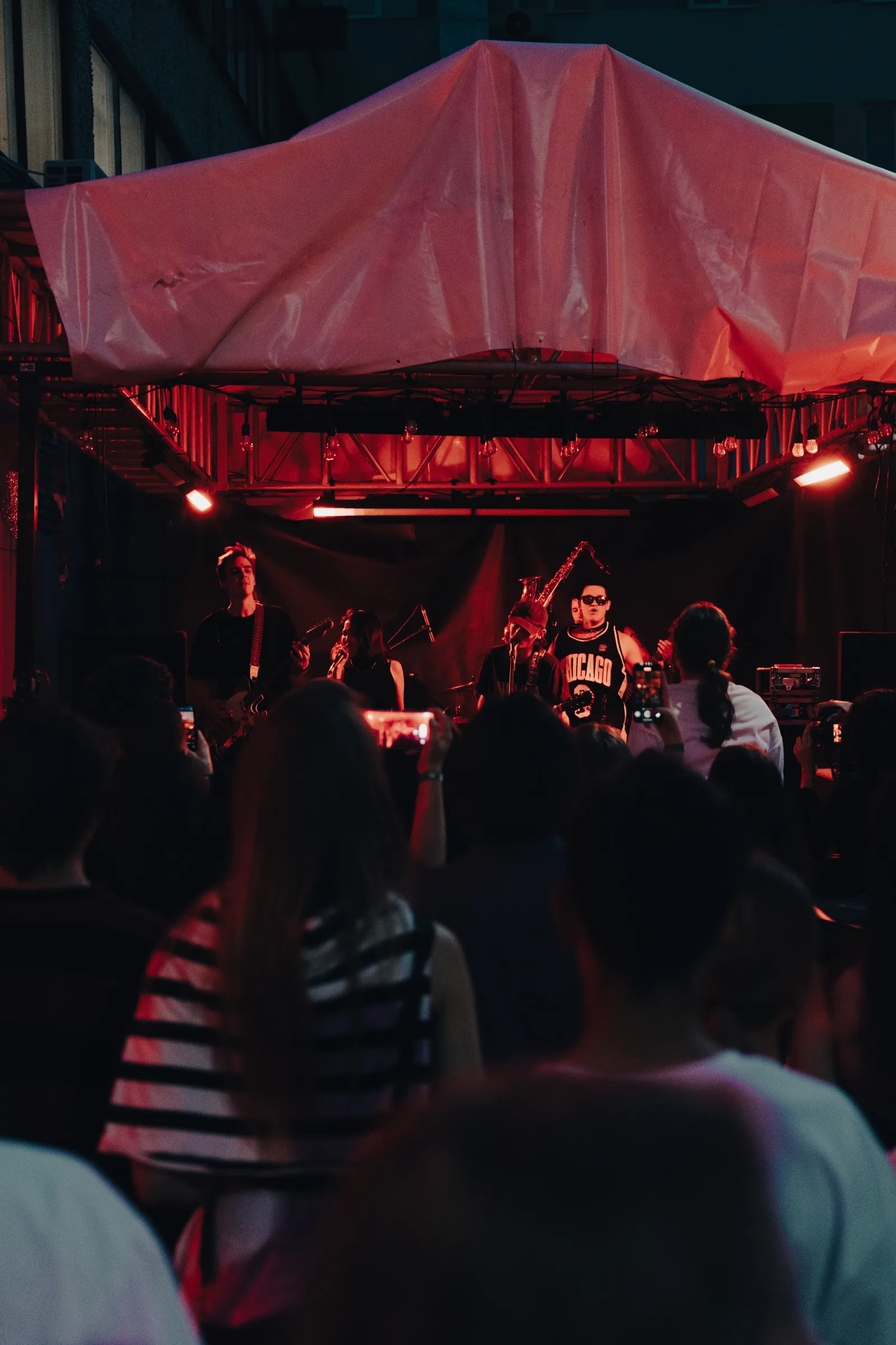 The tent stage in red light