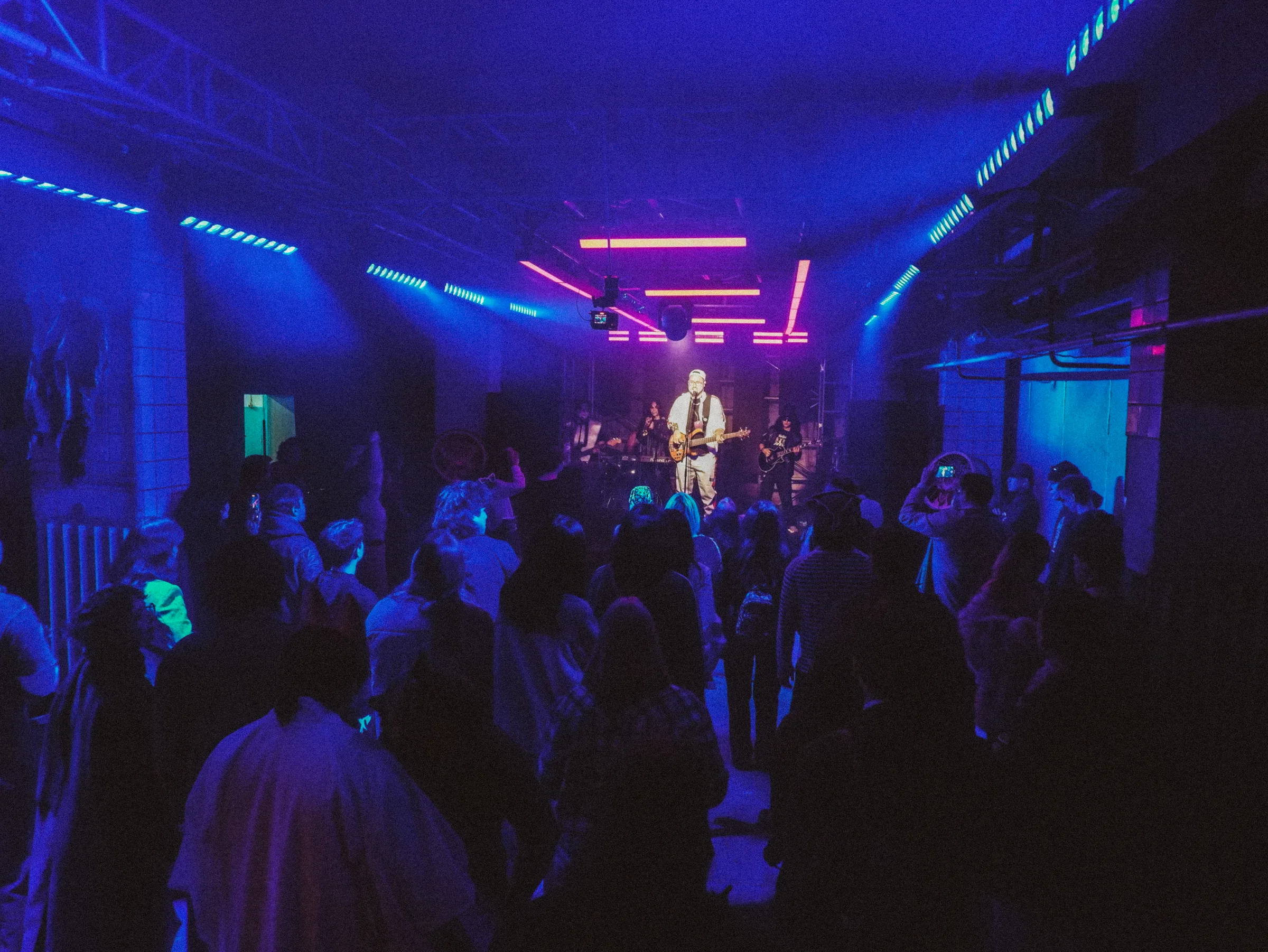 A JAR night: a guitarist on a blue-lit stage and the crowd
